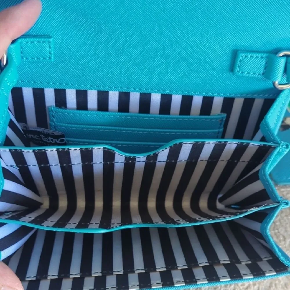 Stylish Blue Crossbody Bag with Dog Design